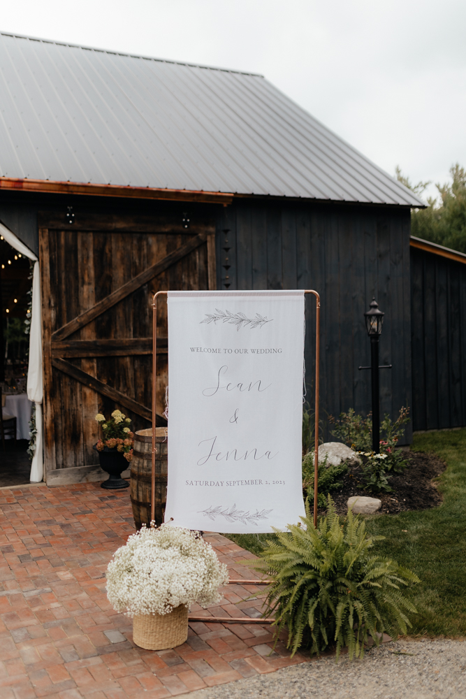 wedding day welcome signage at the Barn at Pinestone near Lake Placid