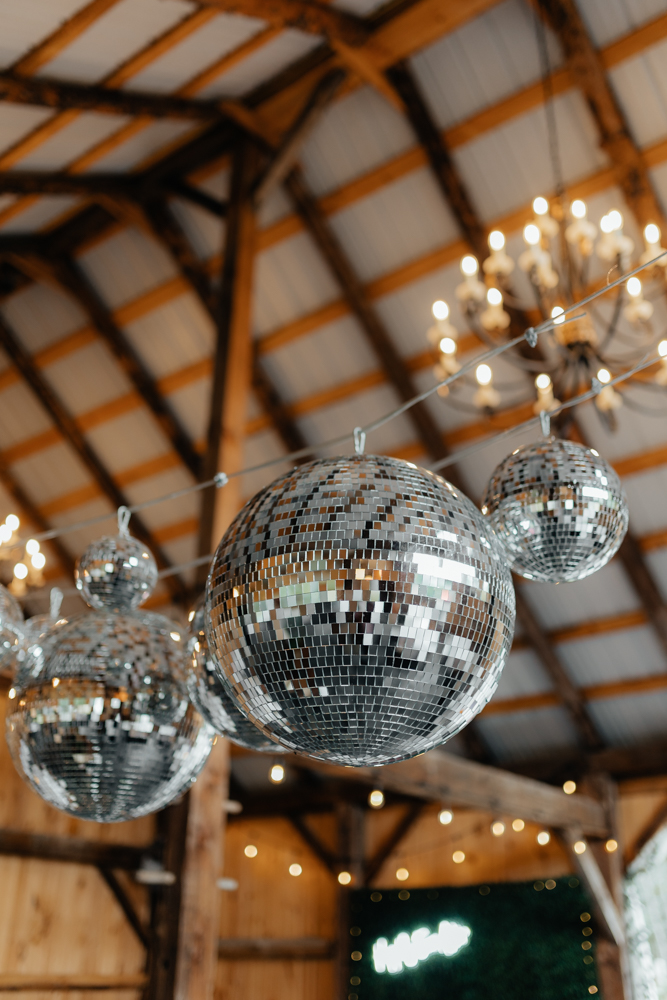 wedding venue disco ball decor at the Barn at Pinestone