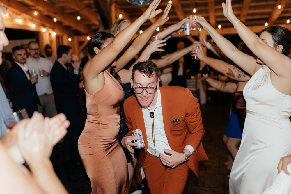 Groom on the dance floor at the Barn at Pinestone