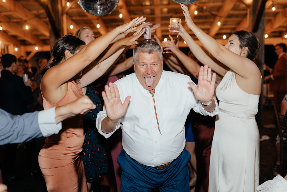 father of the bride dancing at the Barn at Pinestone