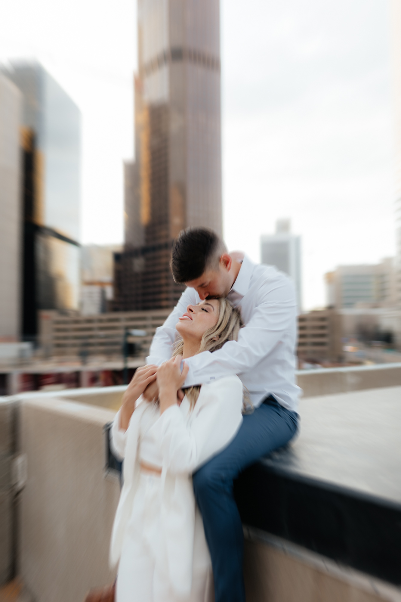 Couple on parking garage in downtown Denver Colorado