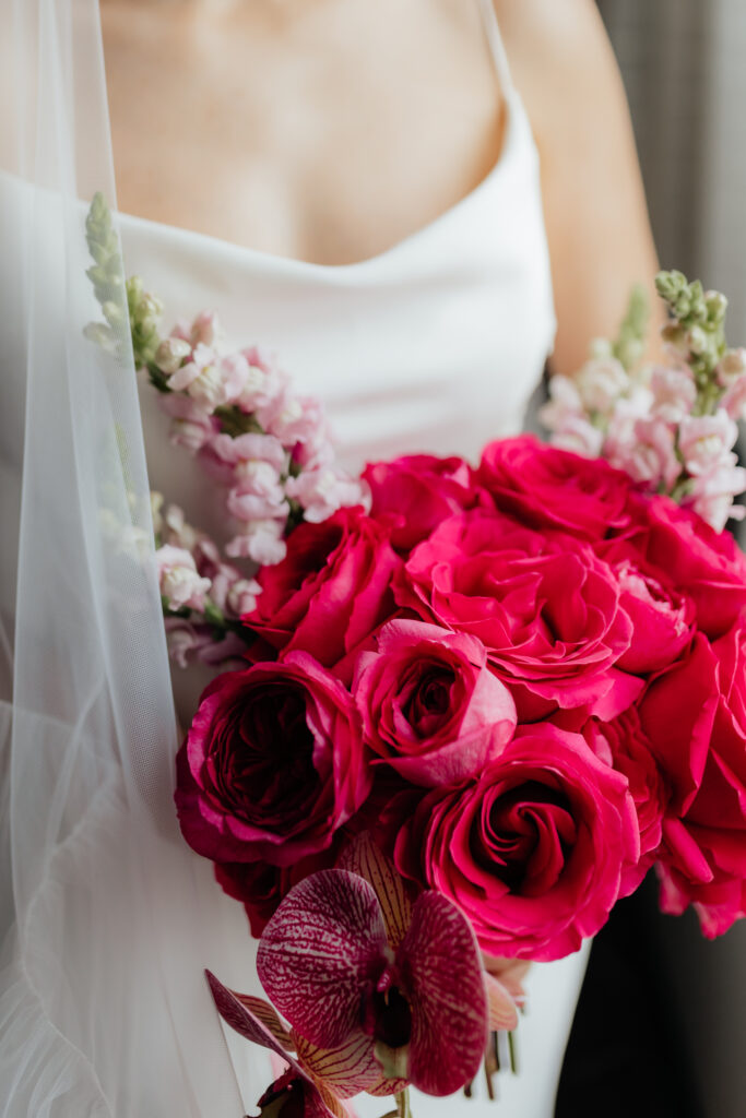 Elegant bride with pink flowers on her wedding day