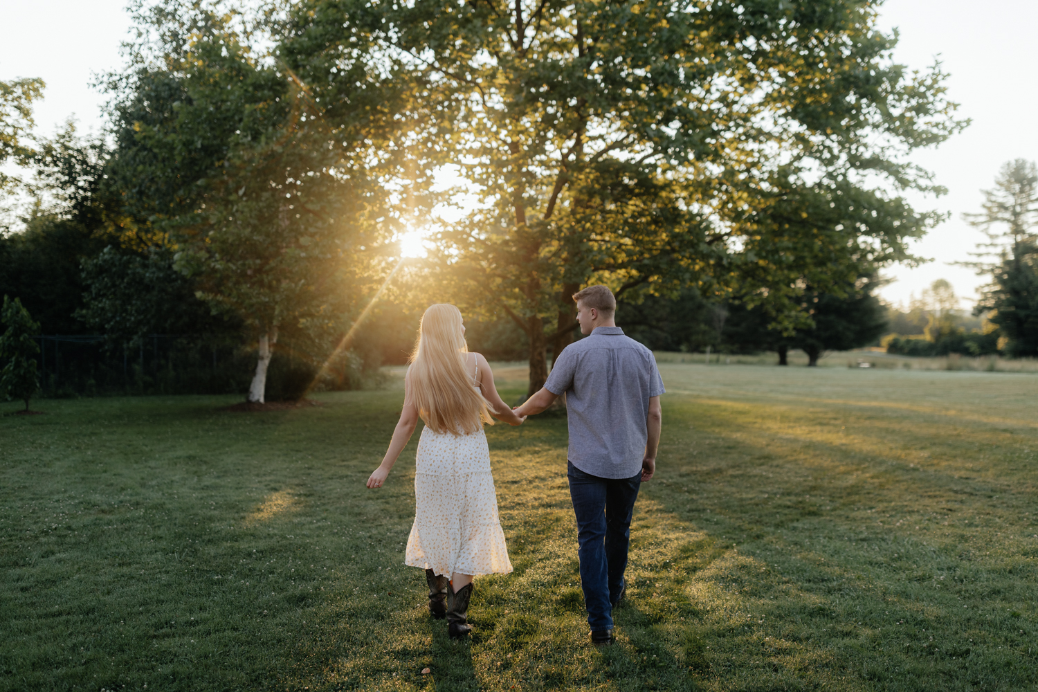 Couple walking as the sun rises