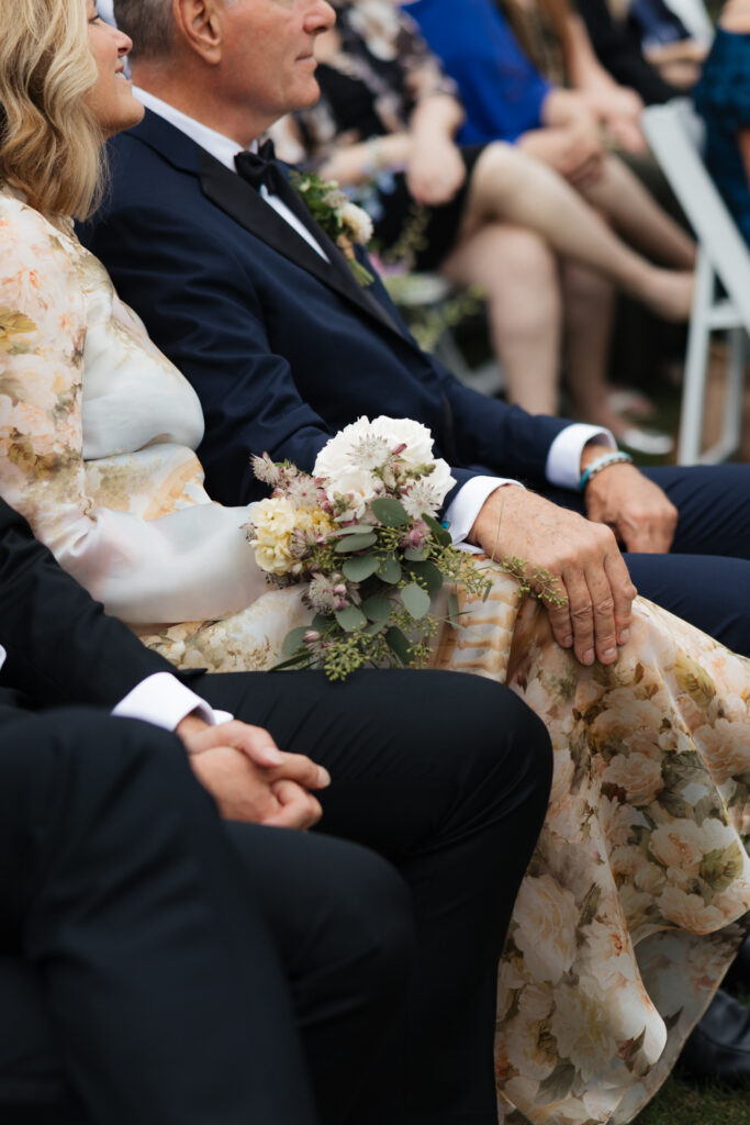 mom and dad watch lakeside ceremony in the Adirondacks