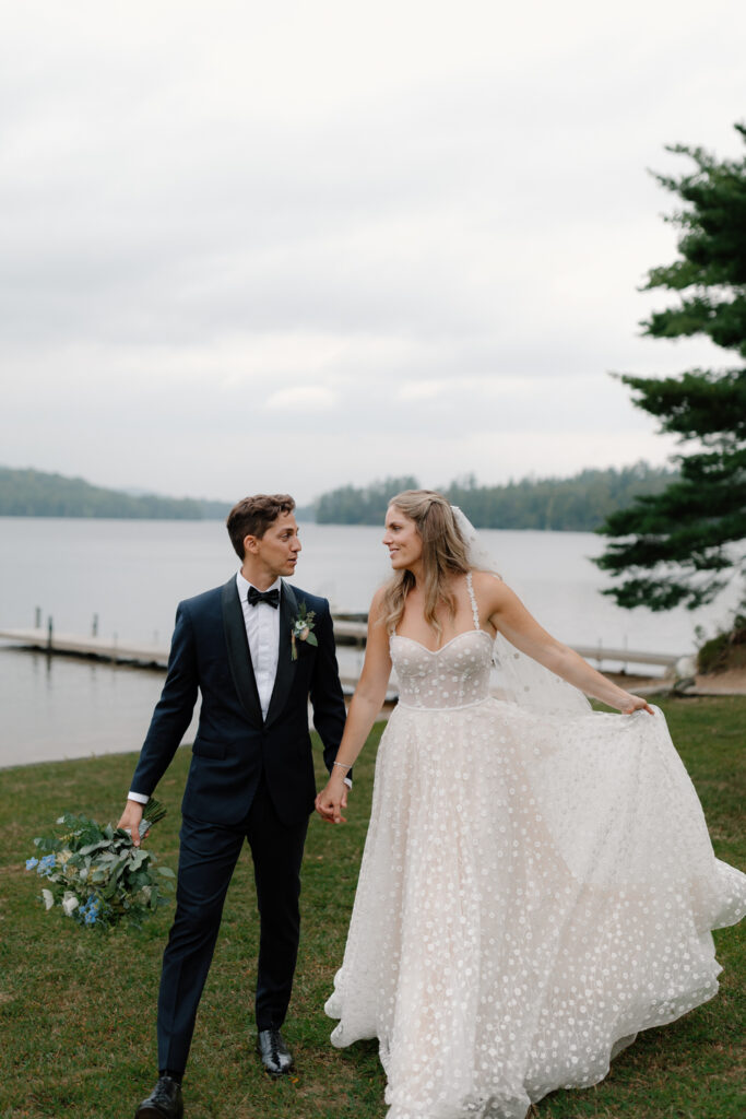 bride and groom portraits on the lake in the adirondacks