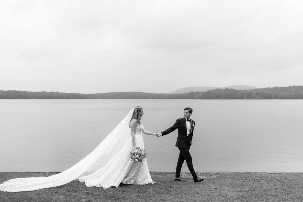 bride and groom portraits on the lake in the adirondacks