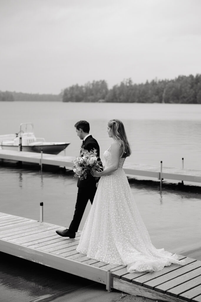 bride and groom portraits on the lake in the adirondacks