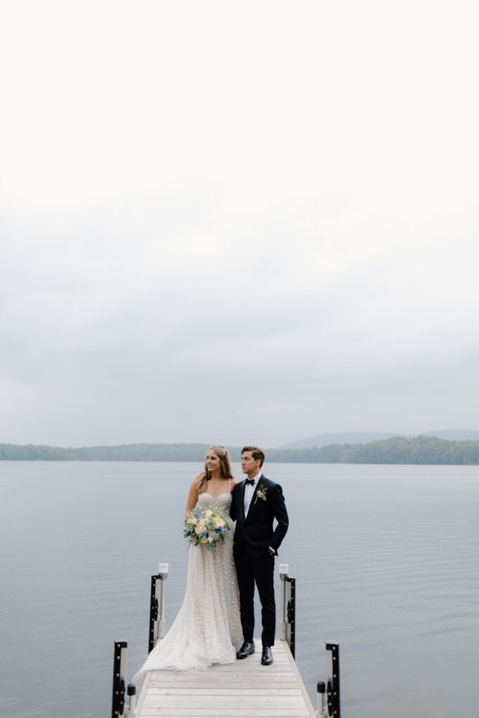 bride and groom portraits on the lake in the adirondacks