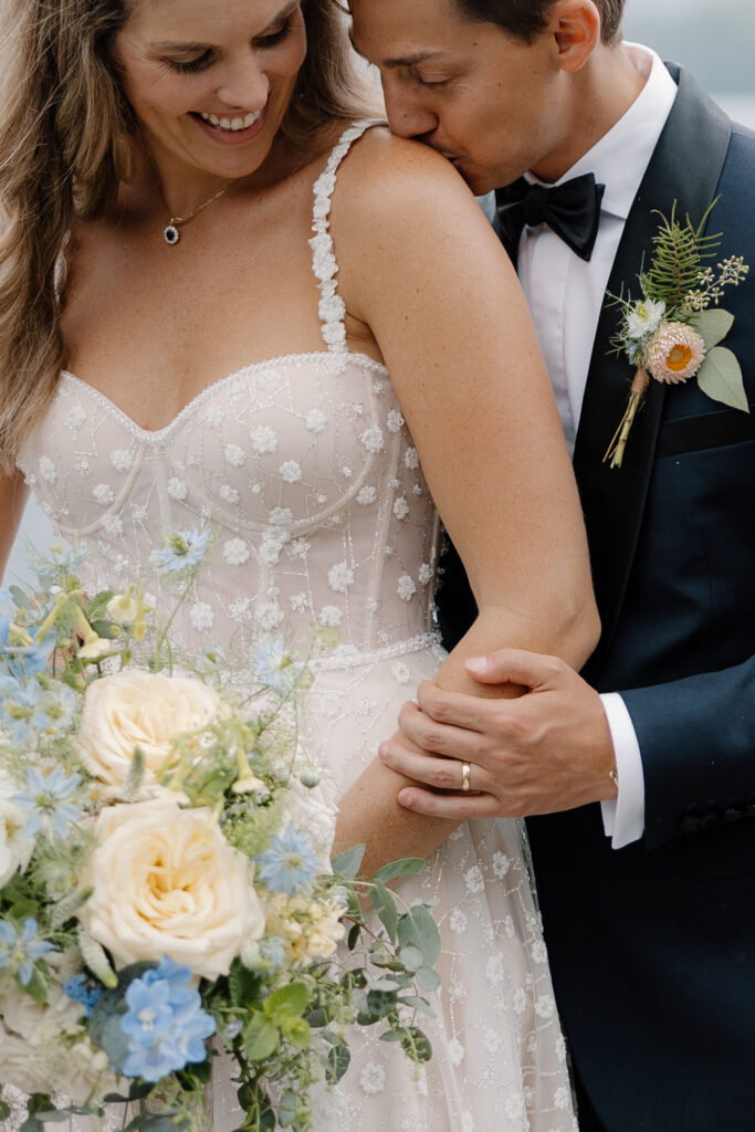 bride and groom portraits on the lake in the adirondacks