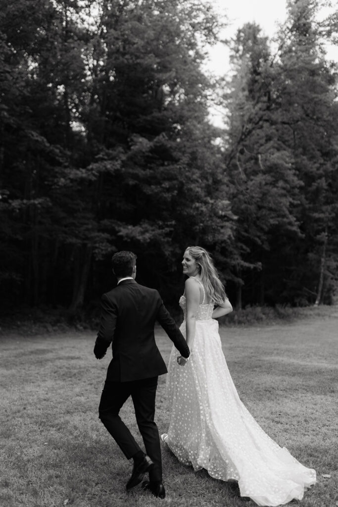 bride and groom portraits on the lake in the adirondacks