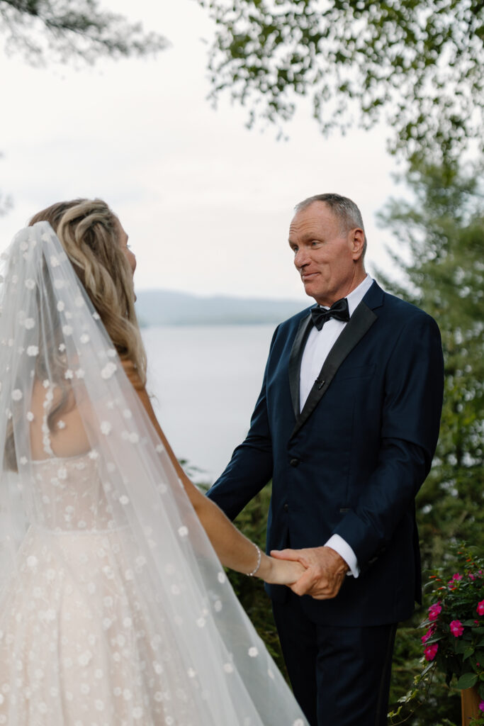 bride has a first look with dad