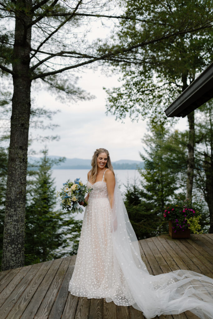 portrait of bride on her wedding day overlooking the Adirondack mountains