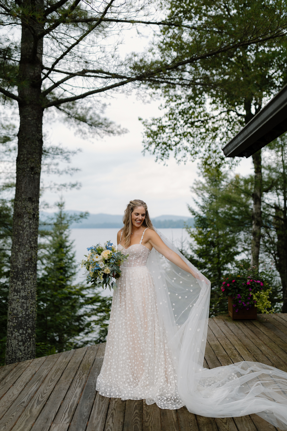 portrait of bride on her wedding day overlooking the Adirondack mountains