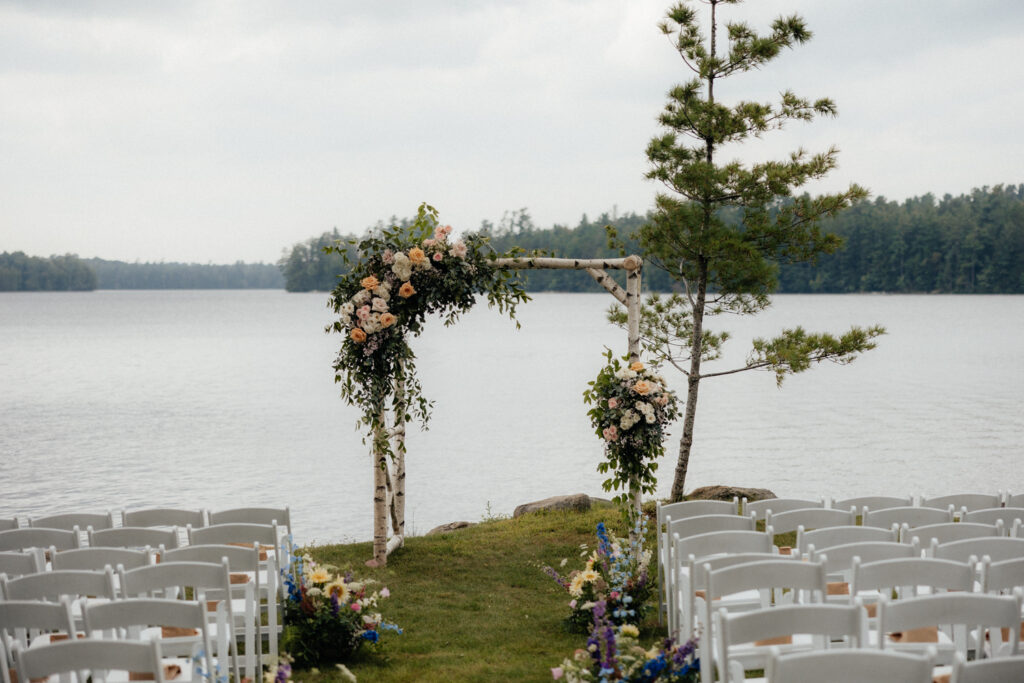 lakeside ceremony setup in the adirondack mountains