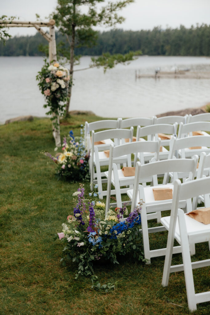 lakeside ceremony setup in the adirondack mountains