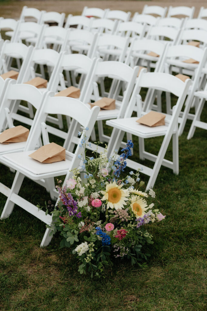 lakeside ceremony setup in the adirondack mountains