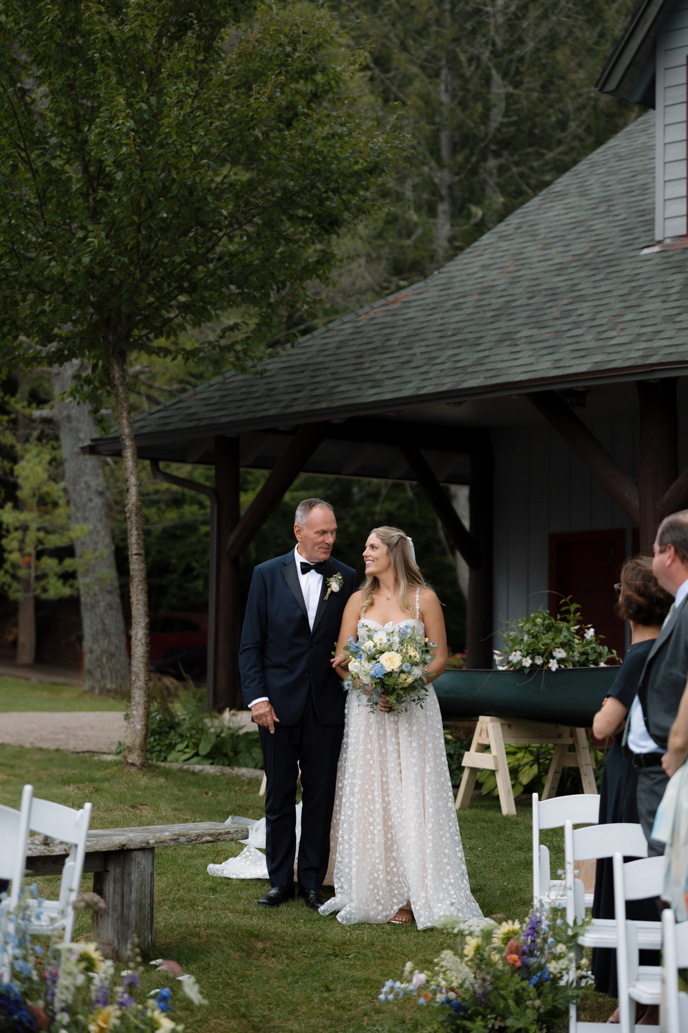 dad walks the bride down the aisle at lakeside ceremony in the Adirondacks