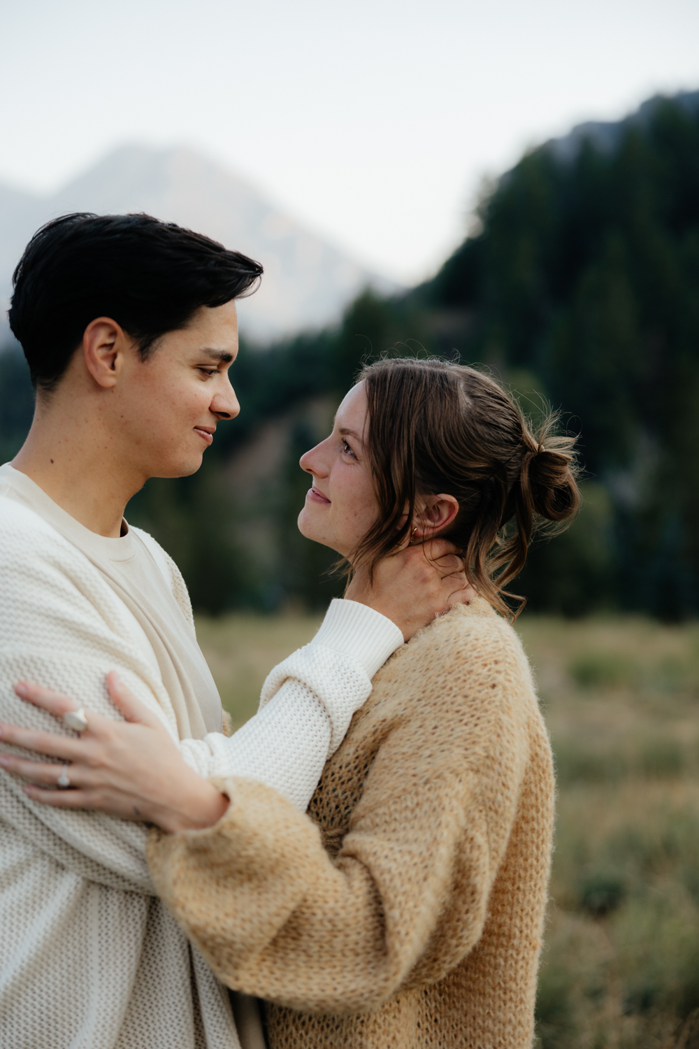 Couple gazes at each other in the Utah Mountains