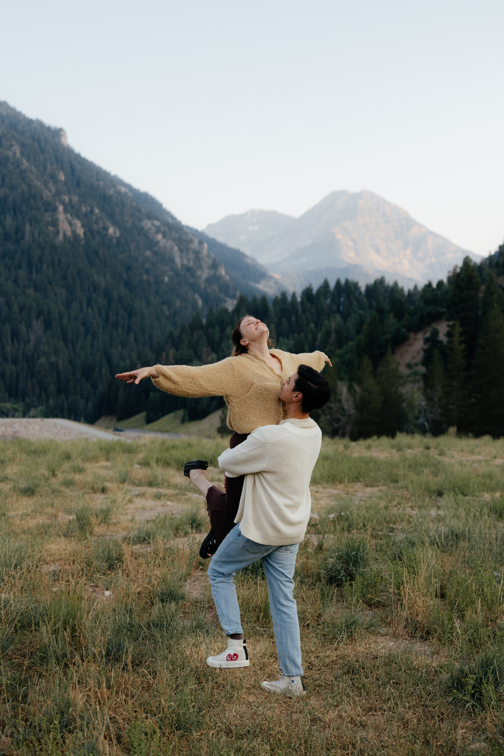 Couple play around at TIbble Fork Reservoir in Utah